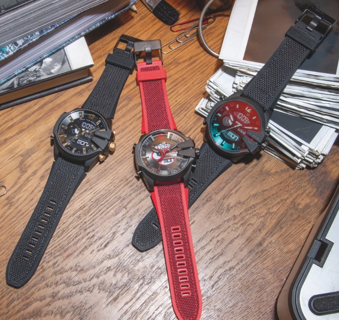 Three Megachief watches in red and black with new analog-digital movement dials.