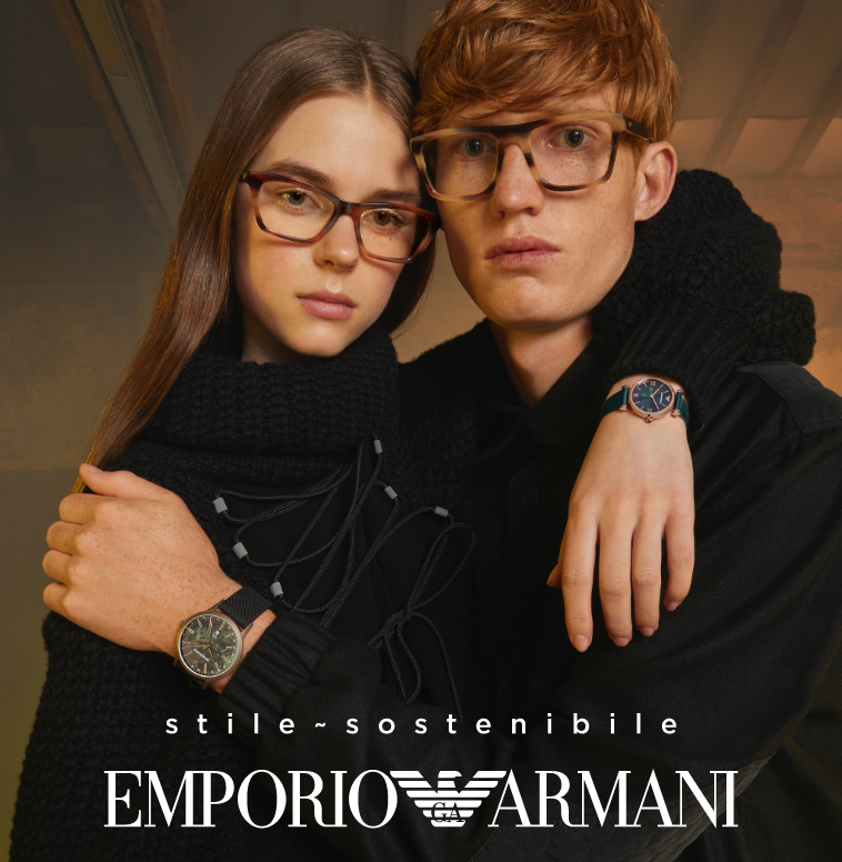 Stylish man wearing navy Emporio Armani watch. Stylish woman wearing striped Emporio Armani watch.