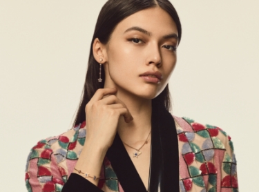 Female modeling jewellery.