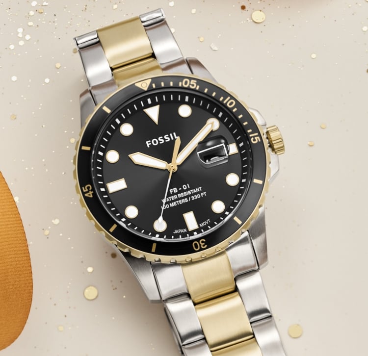 A two-tone dive-inspired Fossil watch.