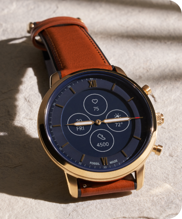 Montre de plongée pour hommes Fossil avec un bracelet en acier inoxydable, un cadran noir et un anneau supérieur tachymètre noir et bleu.