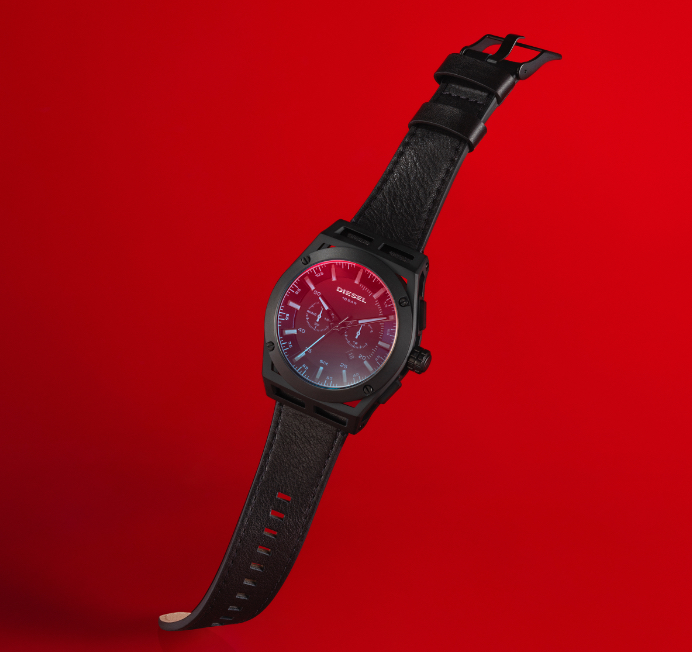 Two Diesel timeframe watches in black.