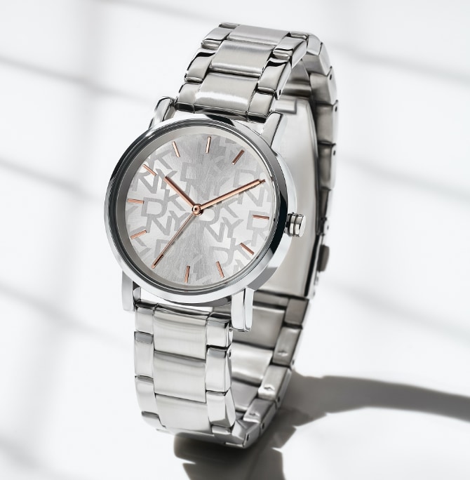Gunmetal and silver-tone DKNY watches featuring signature town and country logo.
