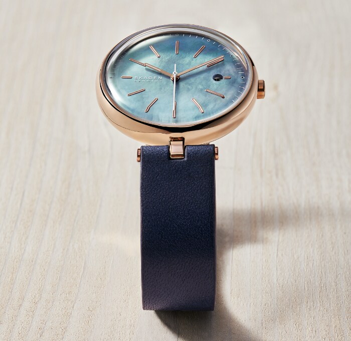 Solar power Skagen watches in all rose gold-tone, navy with rose gold-tone, silver-tone and pink with silver-tone.