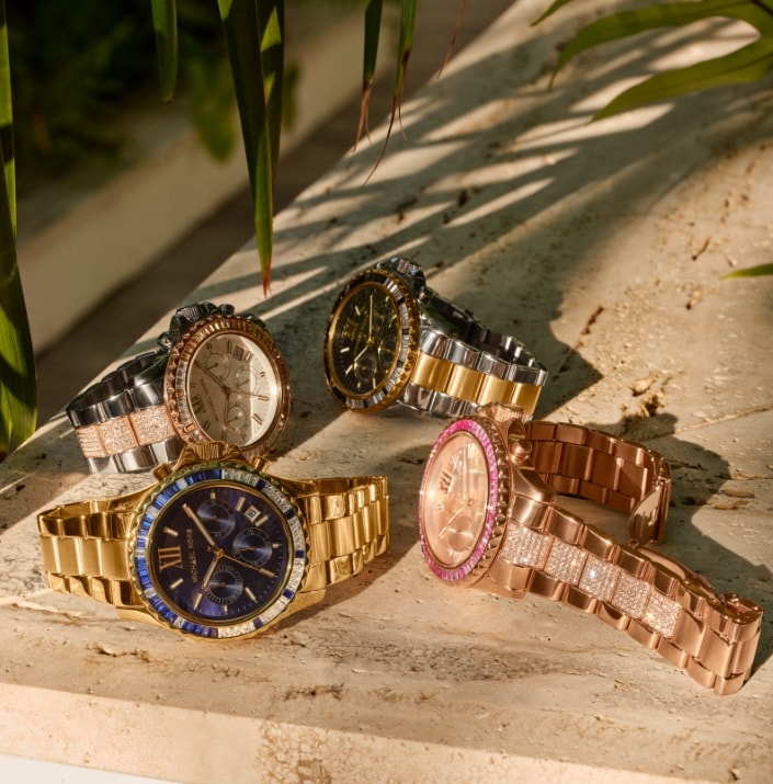 Michael Kors Everest watches in gold, rose gold, and two-tone plating