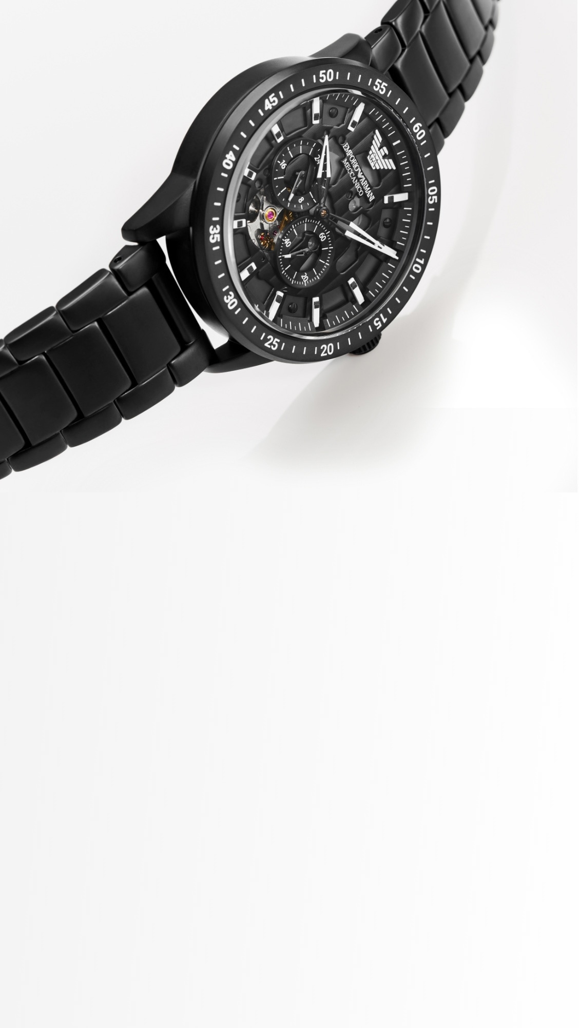 A black Emporio Armani watch on a white background.